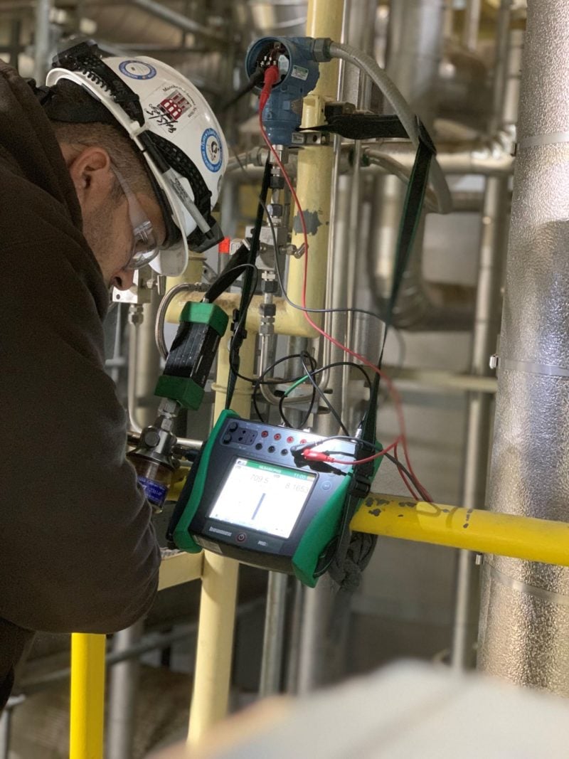 NECI technician using Beamex MC6 calibrator