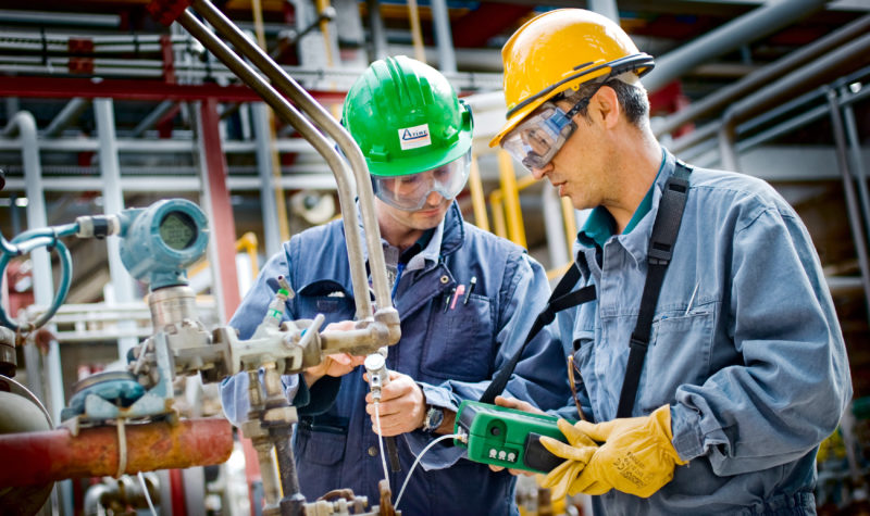 Beamex calibrators being used in process factory